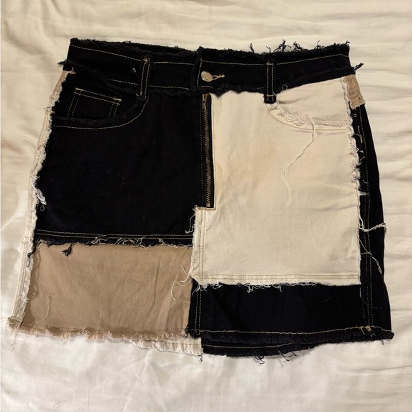 Patchwork Denim Mini Skirt in Black, Cream, and Tan - Picture 1 of 3